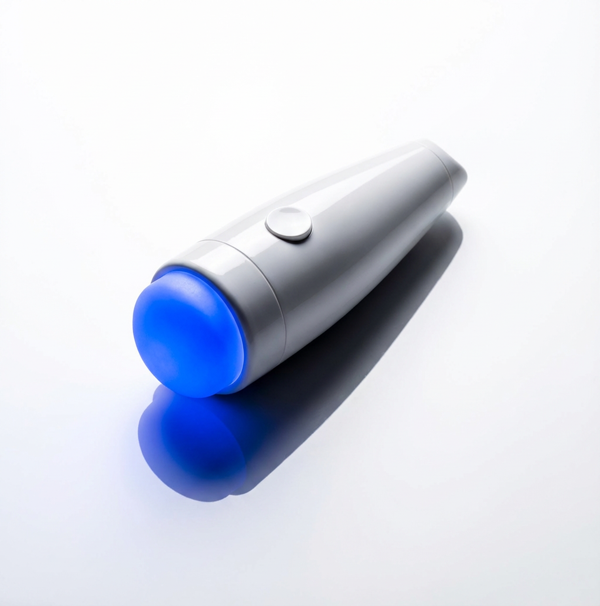 White electronic device with a blue light on a white background