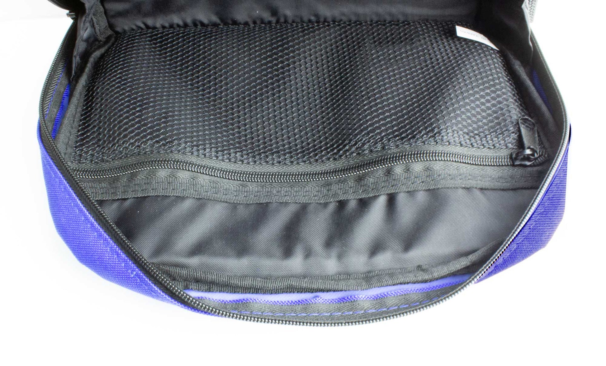 Open bag with blue exterior and gray interior on a white background